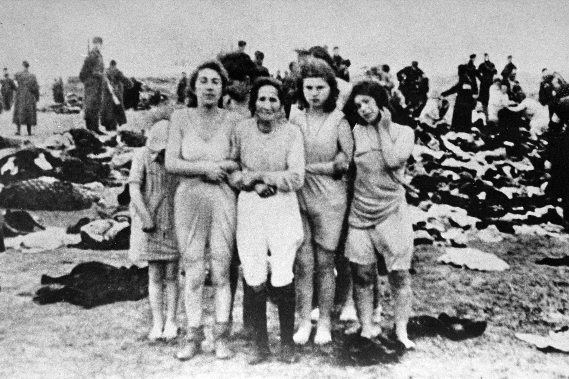 Women members of the Epstein family are forced to pose in their underwear before execution at Skede in Liepaja, Latvia in December 1941.